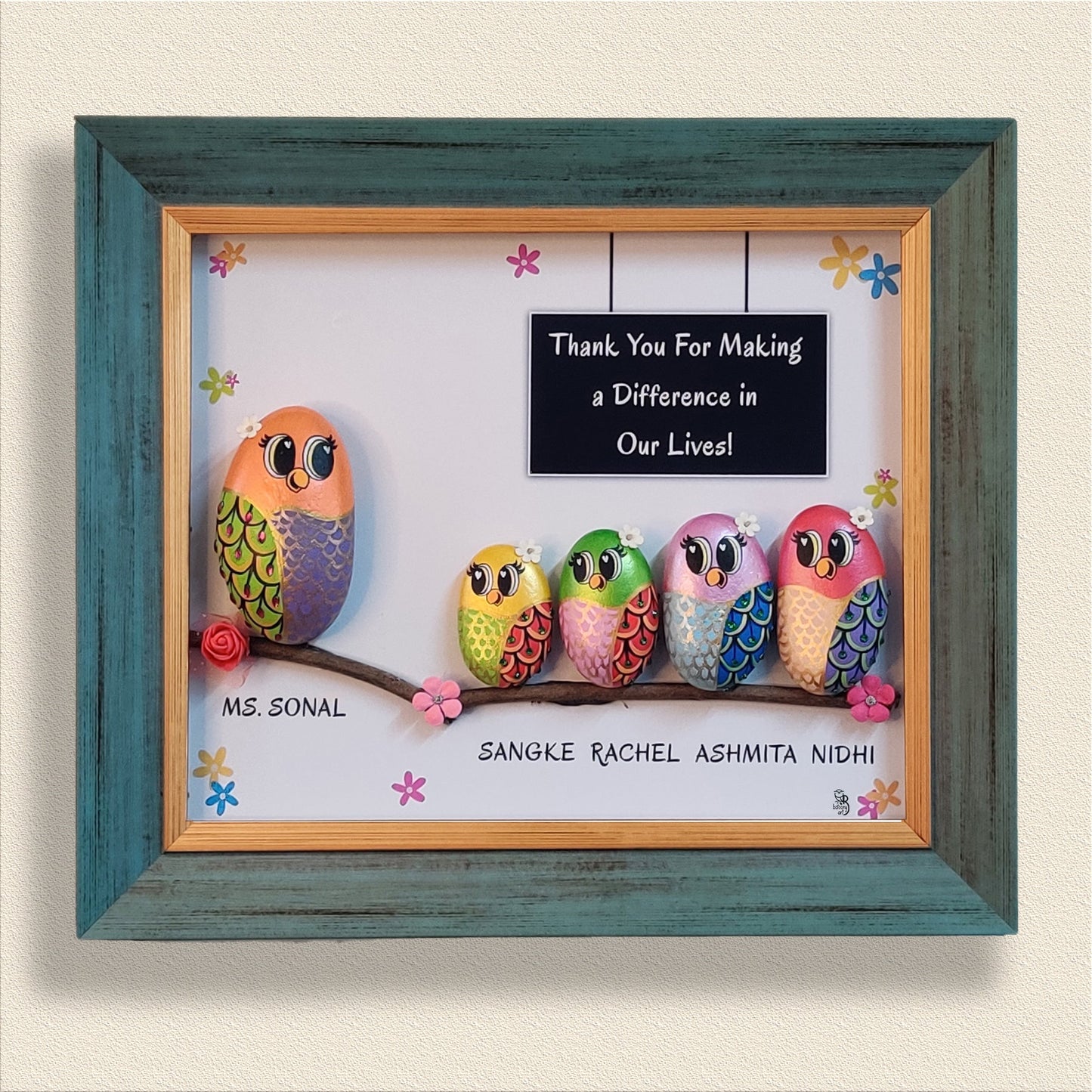 Elegant hand-painted pebble art – perfect for personalized gifting and home styling.
