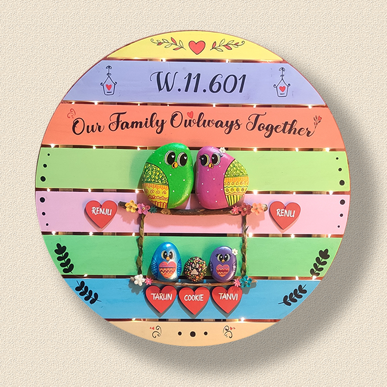 Elegant hand-painted pebble art – perfect for personalized gifting and home styling.