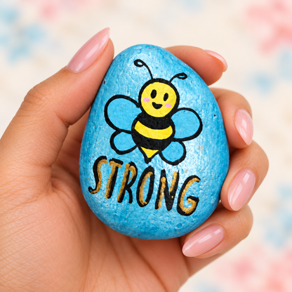 Bee Strong: Little Encouragements: selected hand-painted pebble held in hand