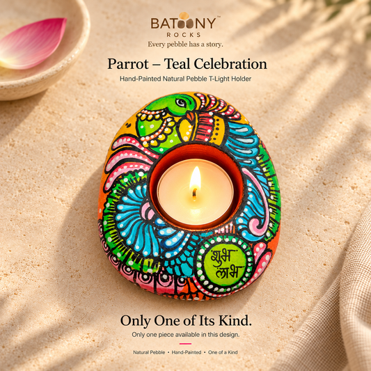 Parrot: Teal Celebration hand-painted natural pebble tealight holder, on a warm stone surface