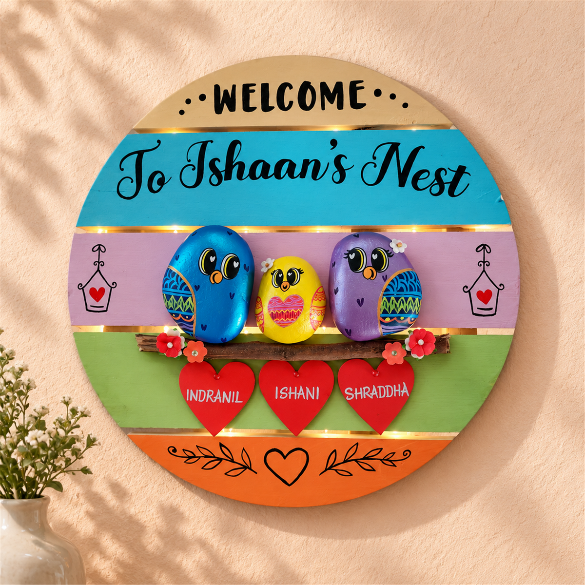 Colourburst Family of 3, three colourful birds on a bright round nameplate, in a home setting