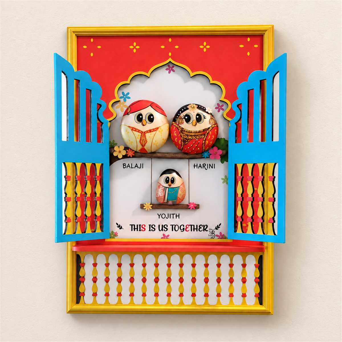 Jharokha Family of 3: three birds in traditional dress inside a red, blue and gold jharokha, on a beige background
