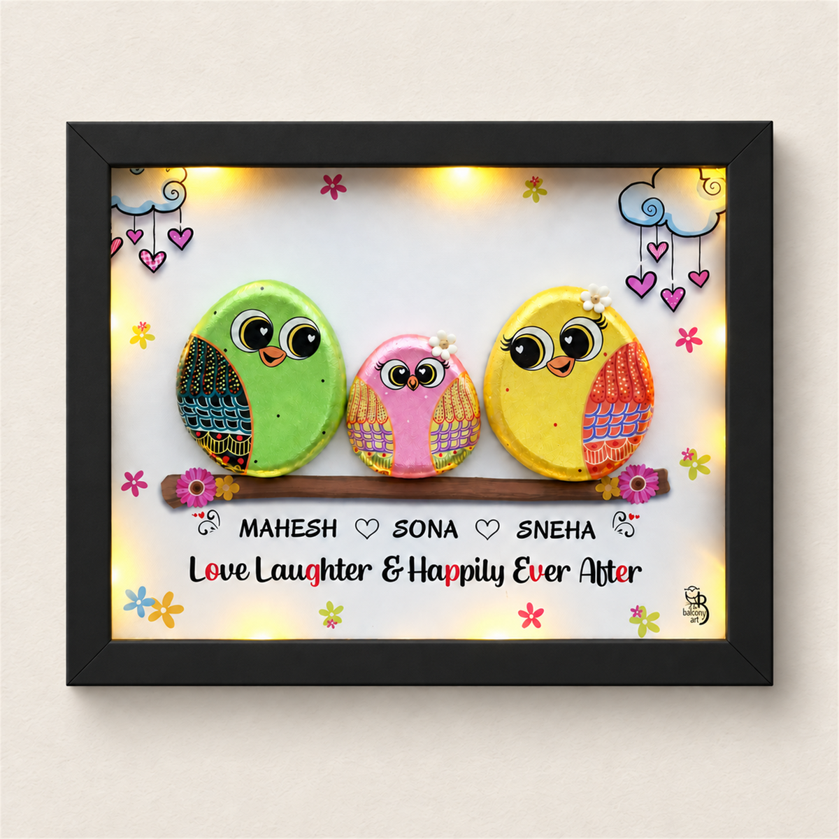 Spark of Grace Trio, black frame on a beige background
