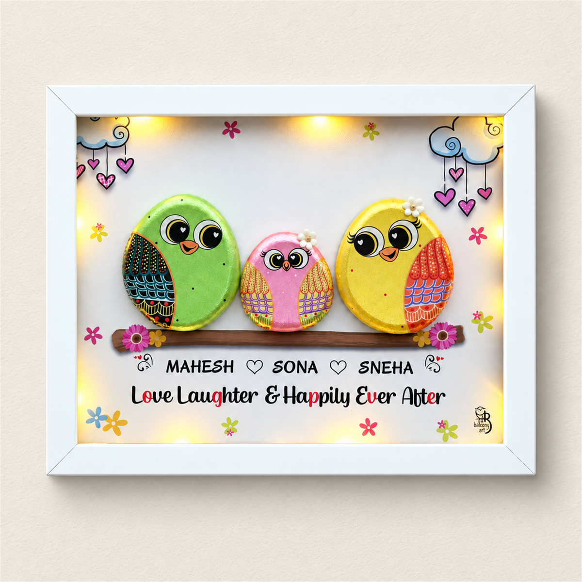 Spark of Grace Trio: green, pink and yellow little birds on a flower-trimmed branch, white frame, on a beige background