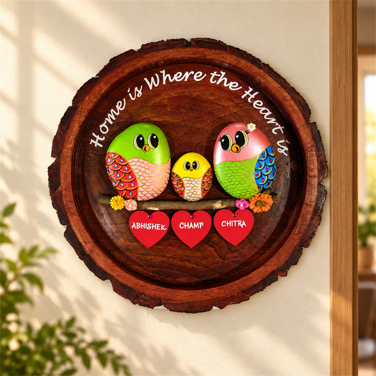 Sweet Home Pebble Art: a family of three birds on round wood with a home-themed message, in a home setting