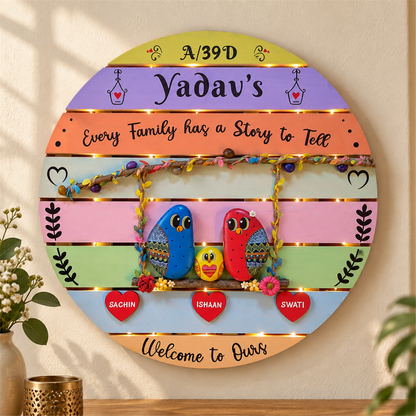 Treasured Narratives Nameboard, family birds on a round pastel nameboard, in a home setting