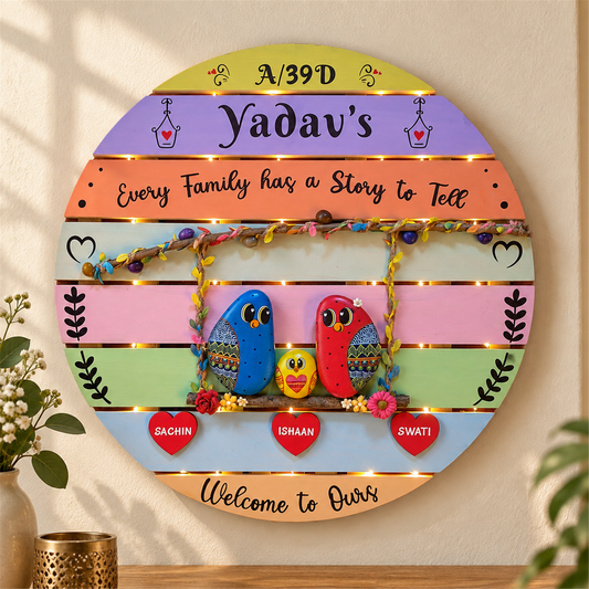 Treasured Narratives Nameboard, family birds on a round pastel nameboard, in a home setting