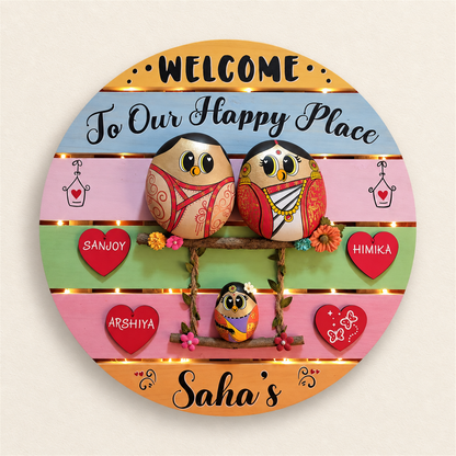 Trio Blissful Haven: a family of three birds on a round wooden wall decoration, on a beige background