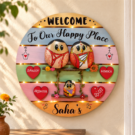 Trio Blissful Haven: a family of three birds on a round wooden wall decoration, in a home setting